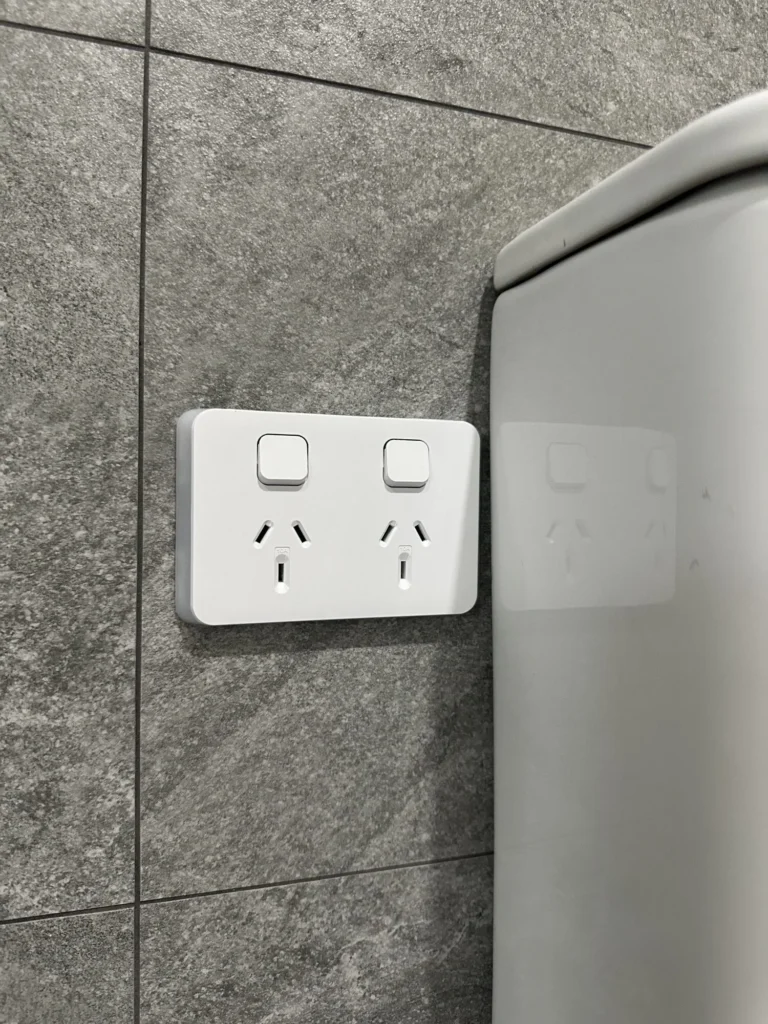 A photo of an electrical power point outlet installed.