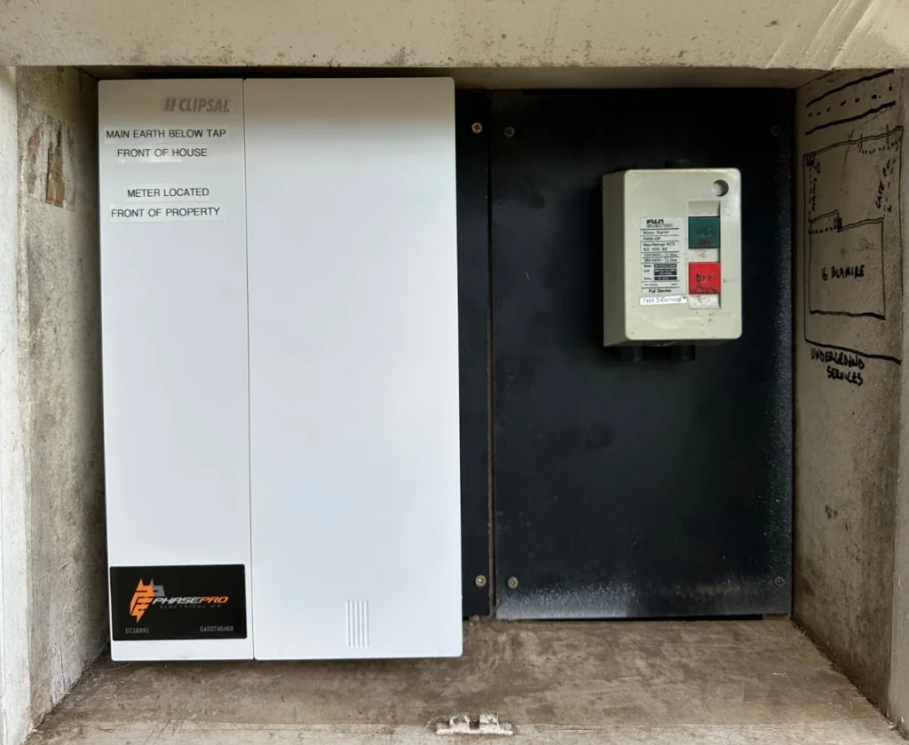 A photo of an electrical switchboard in Perth, with Phase Pro Electrical WA's logo on it.